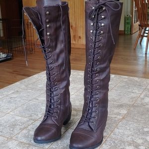 Tall brown lace-up boots